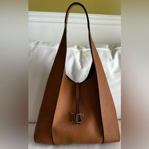 Elegant Tan Leather Bag.  Bag has been authenticated, certificate in pictures.